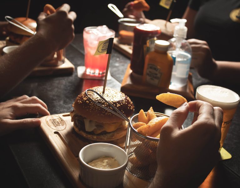 visitors eat at a casual burger restaurant in napa