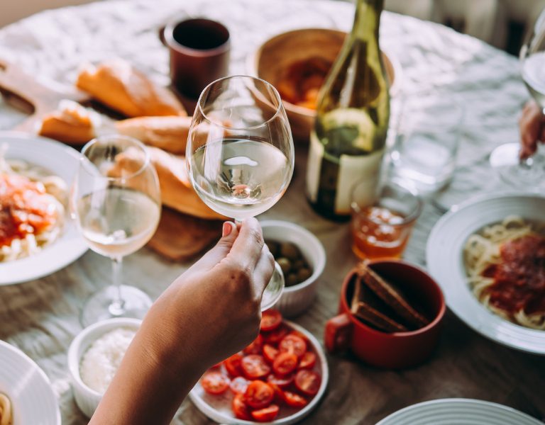 two tourists enjoy a fancy wine lunch in napa valley